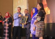 Gubernur Maluku Buka Paritrana Award 2025, Serahkan Santunan Kematian