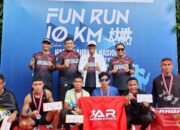 Dua Anggota Yonif 731/Kabaressi Sabet Juara Lari 10 Km di Masohi