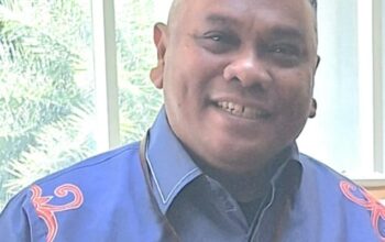 Johny Sumbung, SKM.,M.Kes